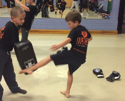 Two kids practicing Kung Fu